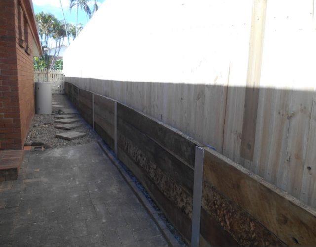 Hardwood Timber Retaining Wall with Steel Posts in Arundel, Gold Coast
