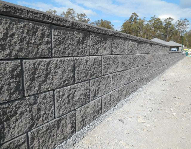 Space-Efficient Versa Concrete Block Wall Construction in Gilston