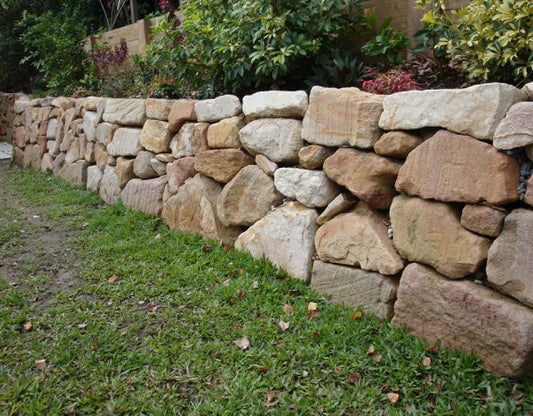 Hand-Built Sandstone Rock Walls in Gold Coast Backyard