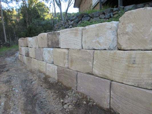 Retaining Wall Gold Coast – Sandstone Block Wall Installation in Tallai