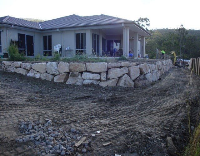 Rock Wall Construction for Vehicle Access in a Gold Coast Home